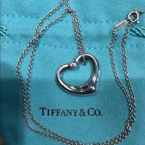 Tiffany & Co Elsa Perretti heart ❤️ with diamond.